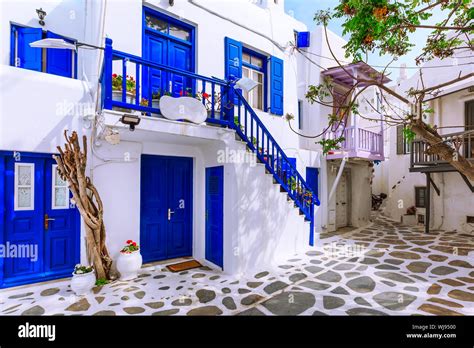 Mykonos Greece Famous Island Street View With White And Blue Houses In