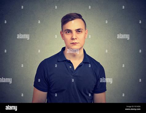 Portrait Of A Serious Young Man Stock Photo Alamy