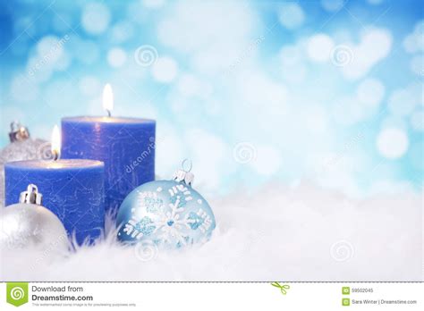Blue And Silver Christmas Scene With Baubles And Candles Stock Image