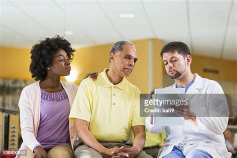 minority patient with doctor photos and premium high res pictures getty images