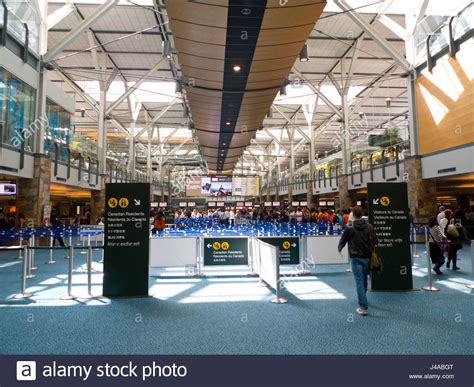 International Arrivals Immigration And Customs Control Area Stock Photo