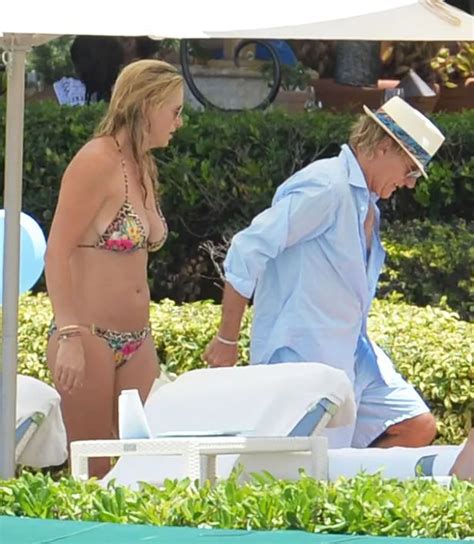 Rod Stewart S Wife Penny Lancaster Shows Off Bikini Body As She Splashes In Sea Irish Mirror