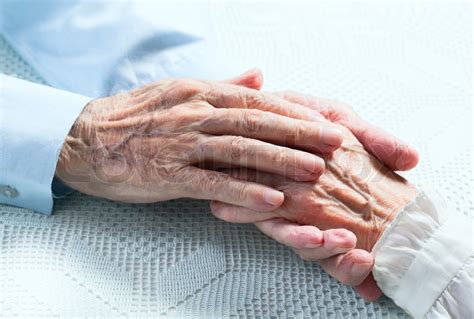 Old People Holding Hands Closeup Stock Photo Colourbox
