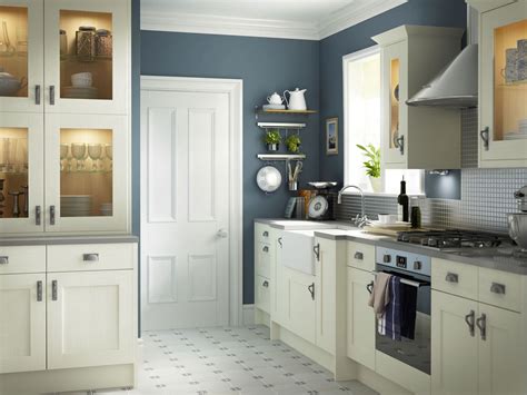 The beauty of a shaker style kitchen is in its simplicity. Carisbrooke Ivory | Blue kitchen walls, Heritage kitchen ...