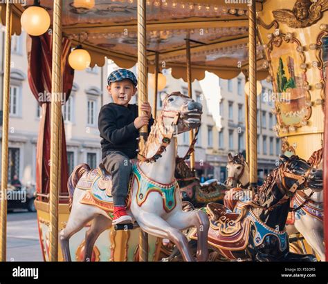 Young Boy Carousel Hi Res Stock Photography And Images Alamy