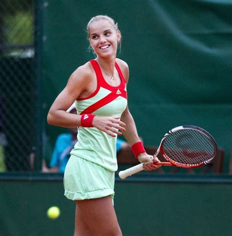 Arantxa rus of netherlands celebrates winning the match against misaki doi of japan towards captain, paul haarhuis during the fed cup world group ii. Picture of Arantxa Rus