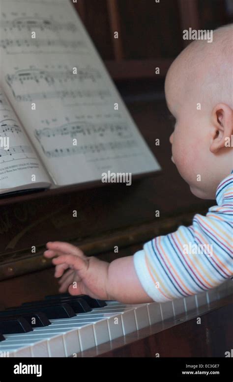 Baby Playing Piano Stock Photo Alamy