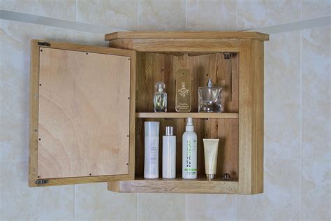You will have more space constraints to think about. Solid Oak Wall Mounted Corner Bathroom Cabinet 701 ...