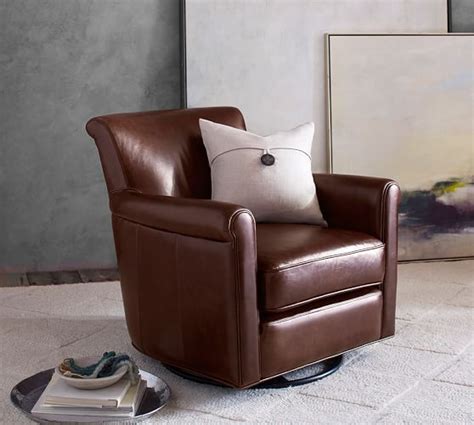 An updated classic with a unique barrel back with button tufting. Irving Roll Arm Leather Swivel Glider | Small recliner ...