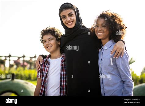 Cinematic image of a family playing at the playground in Dubai Stock