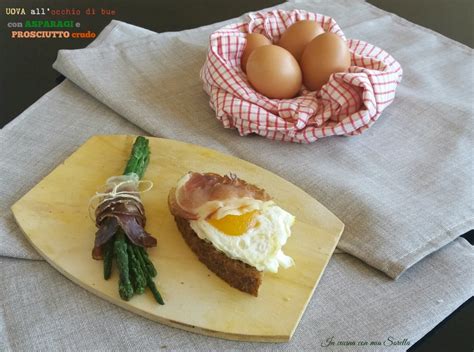 Uova all occhio di bue. Uova all'occhio di bue con asparagi e prosciutto crudo ...