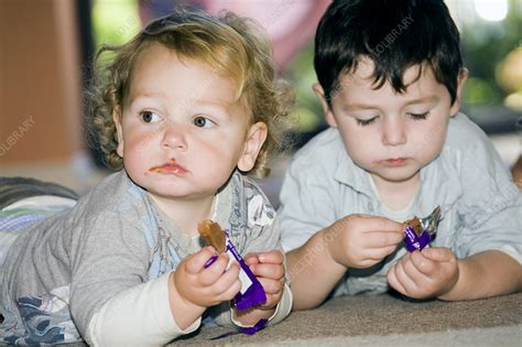 Children Eating Chocolate Bars Stock Image P9200815 Science