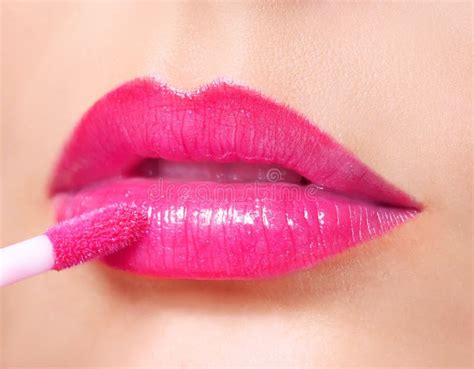 Hot Pink Lipstick Lip Gloss On Lips And Brush Stock Photo Image Of