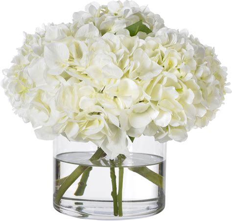 A strategically placed vase pulls the decor of a room together. Diane James White Hydrangea Arrangement | Hydrangea ...