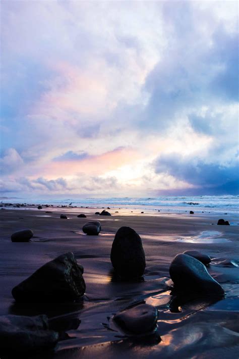 A vibrant and stormy sunset on the Oregon coast, Lincoln City, OR, USA