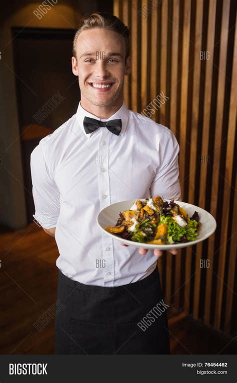 Smiling Waiter Showing Image And Photo Free Trial Bigstock