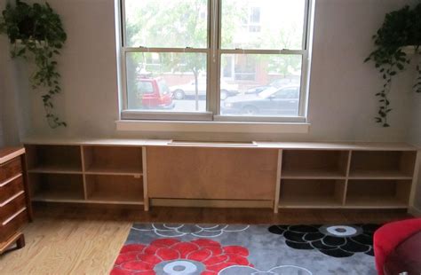 Your radiator cabinet could form part of, for example, your entertainment unit or bookcases. Rudi Blog: Built In Bookcase Over Radiator