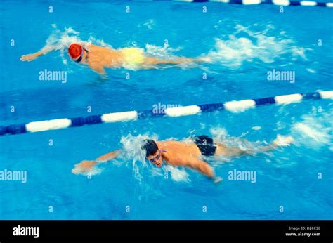Male Swimmers Doing Laps In Pool Stock Photo Alamy