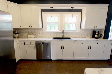 Decorating a white or gray kitchen with black appliances. White Kitchen with Marble Look Laminate Countertop ~ Akron ...