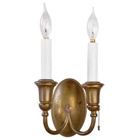 Get this exqisite refined colonial brass wall sconce model s110 at lighting by hammerworks. Bradley and Hubbard Colonial Sconce Suite at 1stdibs