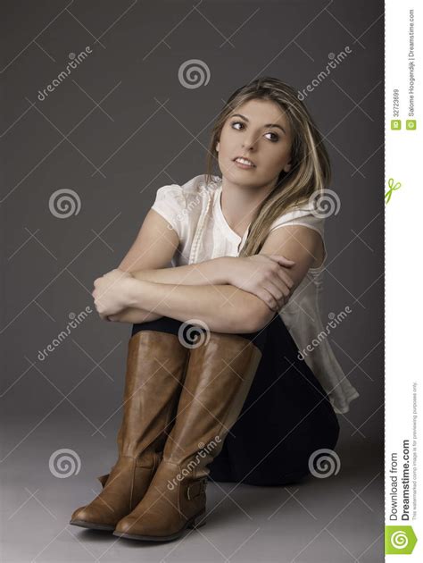 Closeup Of Brown Leather Boots And Girl Sitting In Stock Photo Image Of