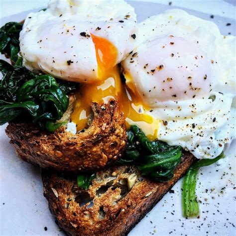 Poached Eggs With Spinach And Rosemary Basil Infused Olive Oil Recipe