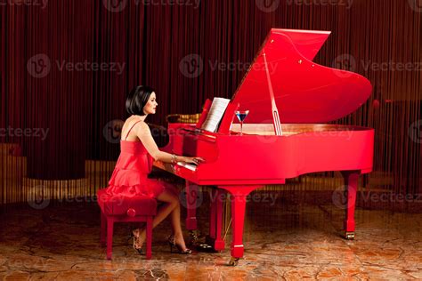 Beautiful Woman Playing The Piano 1430859 Stock Photo At Vecteezy