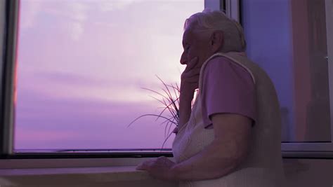 Lonely Old Woman Looking Out Stock Footage Video 100 Royalty Free