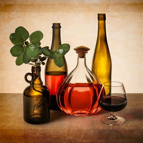 Still Life With Wine Bottles And Greenery Photograph By Greg Brave