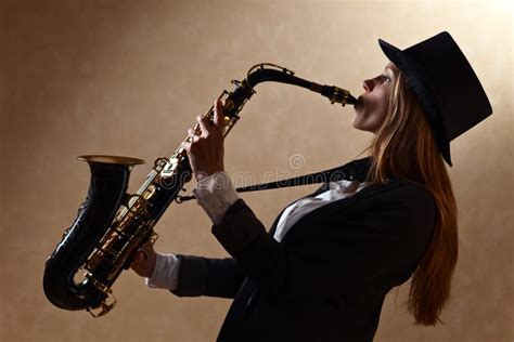 Young Beautiful Woman With Saxophone Stock Image Image Of Nightclub