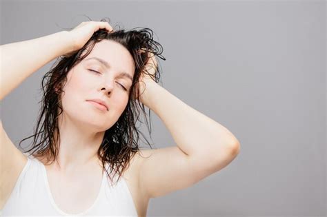 Premium Photo Woman With Wet Hair After A Shower