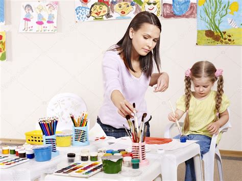 Child Painting In Preschool Stock Photo By ©poznyakov 5737607