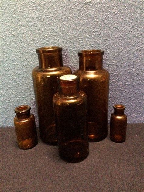 Vintage Brown Glass Apothecary Bottles Assortment Of Five Apothecary