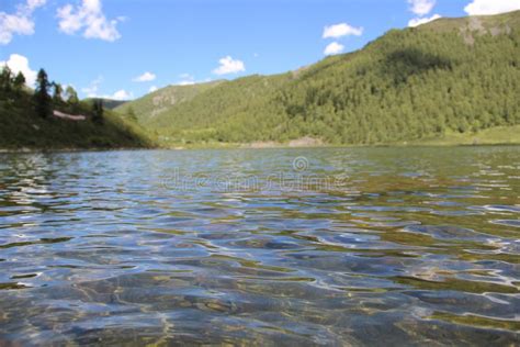 A Crystal Clear Lake On A High Mountain Of Sichuan Province In Summer