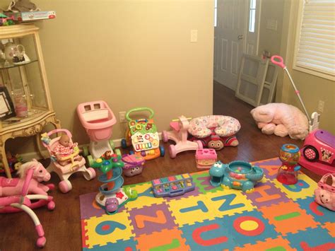 Balls are a classic baby toy because baby can push them around on his own, place one in and out of a cup or bowl for a lesson on object permanence (or parents can do it for younger babies) or chase after it around your living room as he becomes more adept at crawling and walking. Walkin' On Sunshine: Playroom Ideas