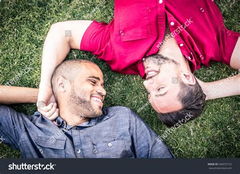 Happy Gay Couple Lying Down On Stock Photo Edit Now