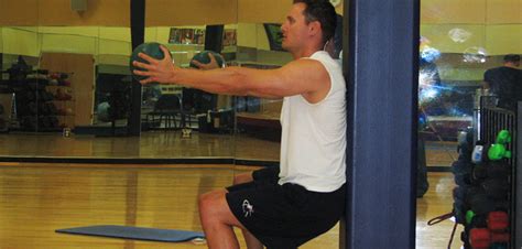 Wall Squats Medicine Ball Exercise Guide With Photos