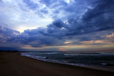 Beach And Cloudy Sunset Sky