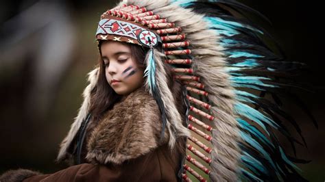 Beautiful Cute Little Girl With Native American Dress Standing In Blur