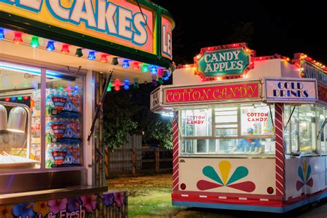 Concession Stands At The County Fairgrounds At Night Time By Juli