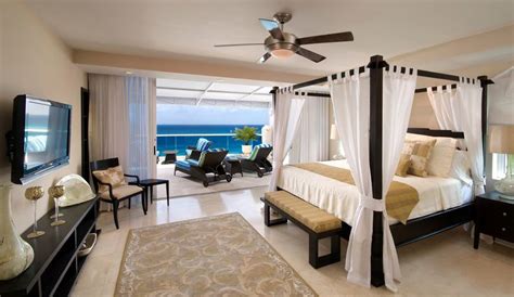Gorgeous Master Bedroom With A Balcony Overlooking The Beautiful Ocean
