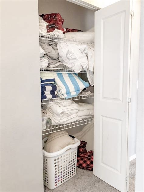 Simple And Easy Small Linen Closet Organization Organizing A Tiny Hall