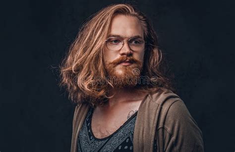 Close Up Portrait Of A Redhead Hipster Male With Long Luxuriant Hair