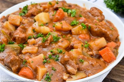 Slow cooker pork stew has tender chunks of meat and complementing vegetables in a flavorful broth! Pork Stew (One Pot Comfort Food!) - Gonna Want Seconds