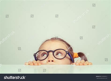 Cute Little Girl Hiding Behind Table Stock Photo 324569912 Shutterstock