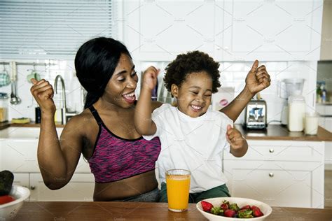 Mother And Son Eating Healthy Food ~ Photos ~ Creative Market