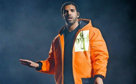 Drake Is Wearing Black T Shirt Orange Jerkin In Black Fog Background Hd