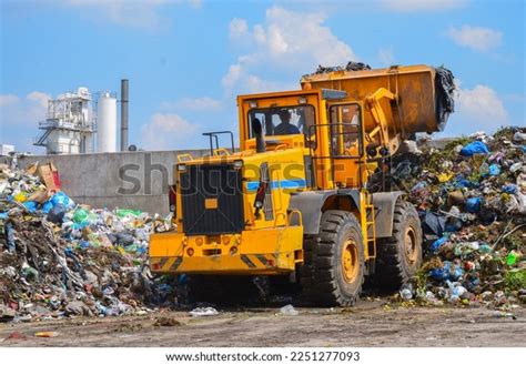 Wheel Loader On Landfill Sorting Rubbish Stock Photo 2251277093