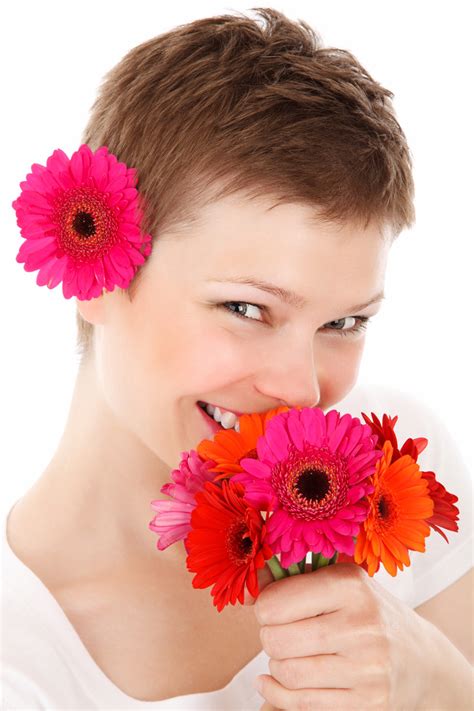 Woman Holding Flowers Free Stock Photo Public Domain Pictures