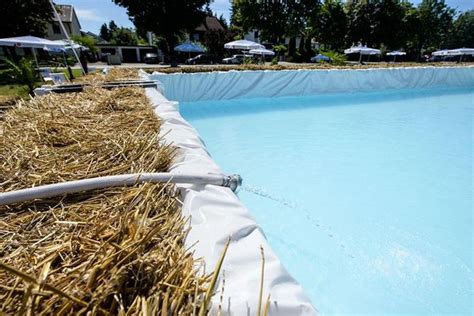 Removable mesh pool fence makes your pool safer for children. Seven Ideas for Do-It-Yourself Backyard Pools in 2020 | Backyard pool, Hay bale pool, Backyard